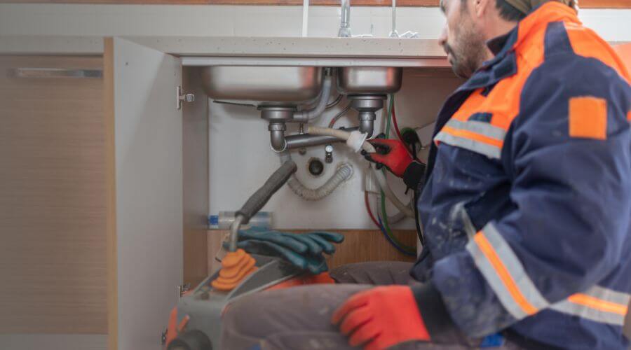 Professional slab leak plumber services in Schneider, IN